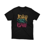 Claim the throne of style with Apparel by Cetakshop's King of the Grill graphic tee, spicing up Black fabric. The image shows a king of the grill graphic tees.