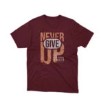 Embrace resilience with Apparel by Cetakshop's 'Never Give Up' New York Brooklyn graphic tee, a gritty urban vibe on Maroon fabric.