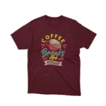 Indulge in the essentials with Apparel by Cetakshop's 'Coffee Breaks Are Necessary' graphic tee, a must-have on Maroon fabric.