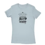 Image of a Light Blue 'Confident Women Empower Women' T-shirt by Apparel by Cetakshop, promoting women's empowerment and unity with an inspirational message.