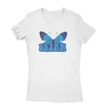 Dreamy Butterfly Tee by Apparel by Cetakshop. T Shirt for women decorated with a blue butterfly and 'DREAM' text, a serene addition.