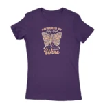 Women's Purple T-shirt with 'Powered by Fairy Dust and Wine' print, a whimsical creation by Apparel by Cetakshop.