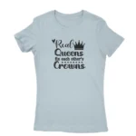 Image of a Light Blue 'Real Queens Fix Each Other's Crowns' T-shirt for women, by Apparel by Cetakshop, symbolizing female solidarity and support.