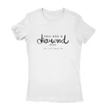 Diamond Strength Tee by Apparel by Cetakshop. T Shirt for women decorated with 'You are a diamond, dear' typography design print with elegant script and diamond graphic, embodying resilience and grace.