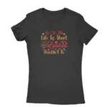 Image of a Black 'Life is Short, Your Lashes Shouldn't Be' T-shirt for women, by Apparel by Cetakshop, featuring playful typography and lash illustrations for beauty enthusiasts.