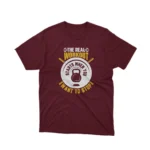 A Maroon tee with 'The Real Workout' encouragement, for the relentless, by Apparel by Cetakshop.