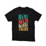 A playful fatherhood message t shirt that mentions 'Real Men Make Twins' slogan on a black graphic tee from Apparel by Cetakshop, ideal for dads with a sense of humor. The image shows a real men make twins graphic tees.