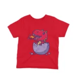 Kids' red t-shirt featuring a friendly red dino hatchling breathing fire, designed by Apparel by Cetakshop, ideal for adding a touch of fantasy to children's casual wear.