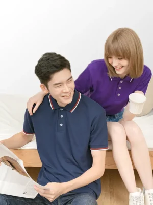 Image of male and female model wearing NORTH HARBOUR Saffron Polo T shirt NHB2700