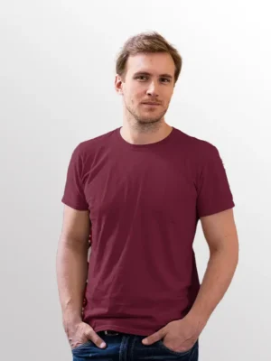 Image of male model wearing NORTH HARBOUR T-Shirt, NHR 1100 Soft Touch Round Neck T-Shirt in Maroon