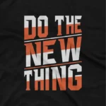 close up image of Apparel by Cetakshop Do the New Thing Graphic Tee - bold and empowering fashion. in Black. The image shows a do the new thing graphic tees.
