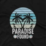 close up image of Apparel by Cetakshop Tropical Paradise Graphic Tee - escape to paradise. in Black. The image shows a tropical paradise graphic tees.