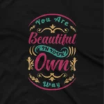 close up image of Celebrate self-love with Apparel by Cetakshop's 'You Are Beautiful In Your Own Way' graphic tee, crafted with love on Black fabric. The image shows a personal development quote graphic tees.