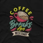 close up image of Indulge in the essentials with Apparel by Cetakshop's 'Coffee Breaks Are Necessary' graphic tee, a must-have on Black fabric. The image shows a coffee breaks are necessary graphic tees.