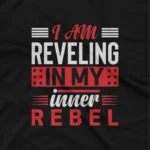 close up image of Apparel by Cetakshop Inner Rebel Slogan Graphic Tee - for the rebellious at heart. in Black. The image shows a inner rebel graphic tees.