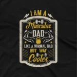 close up image of A Black tee with 'Muscular Dad' text, celebrating cool dads everywhere, from Apparel by Cetakshop. The image shows a muscular dad graphic tees.