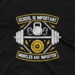 close up image of A Black tee with a humorous 'School vs Muscles' motif, from Apparel by Cetakshop, for the studious gym-goer. The image shows a funny gym quotes graphic tees.