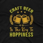 close up image of A Black tee with a 'Craft Beer Happiness' message, from Apparel by Cetakshop, for craft beer enthusiasts. The image shows a craft beer graphic tees.