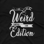 close up image of Black t-shirt with the text "I'm Not Weird, I'm Limited Edition" in white lettering The image shows a limited edition graphic tees.