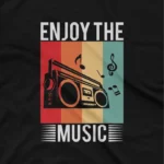 close up image of A Black tee with a vibrant retro music player design, from Apparel by Cetakshop, a blast from the past. The image shows a retro music player graphic tees.