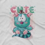 close up image of Blue Cartoon Creature Tee by Apparel by Cetakshop. A blue cartoon creature smiling on a kids White t-shirt, crafted for comfort and style.