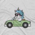 close up image of Driving Unicorn Tee by Apparel by Cetakshop. Kids' White t-shirt with a stylish Driving Unicorn design, for the young dreamers.