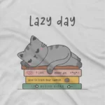 close up image of Lazy Day Cat Tee by Apparel by Cetakshop. Lazy Day Cat kids t-shirt design from Apparel by Cetakshop on a white tee.