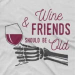 close up image of Vintage Wine & Friends Tee by Apparel by Cetakshop. T Shirt for women decorated with 'Wine & Friends should be old' text, a vintage charm.