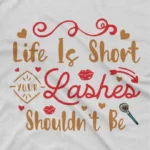 close up image of Lashes Tee by Apparel by Cetakshop. T Shirt for women decorated with 'Life is Short, Your Lashes Shouldn't Be'  design print featuring playful typography and lash illustrations for beauty enthusiasts.